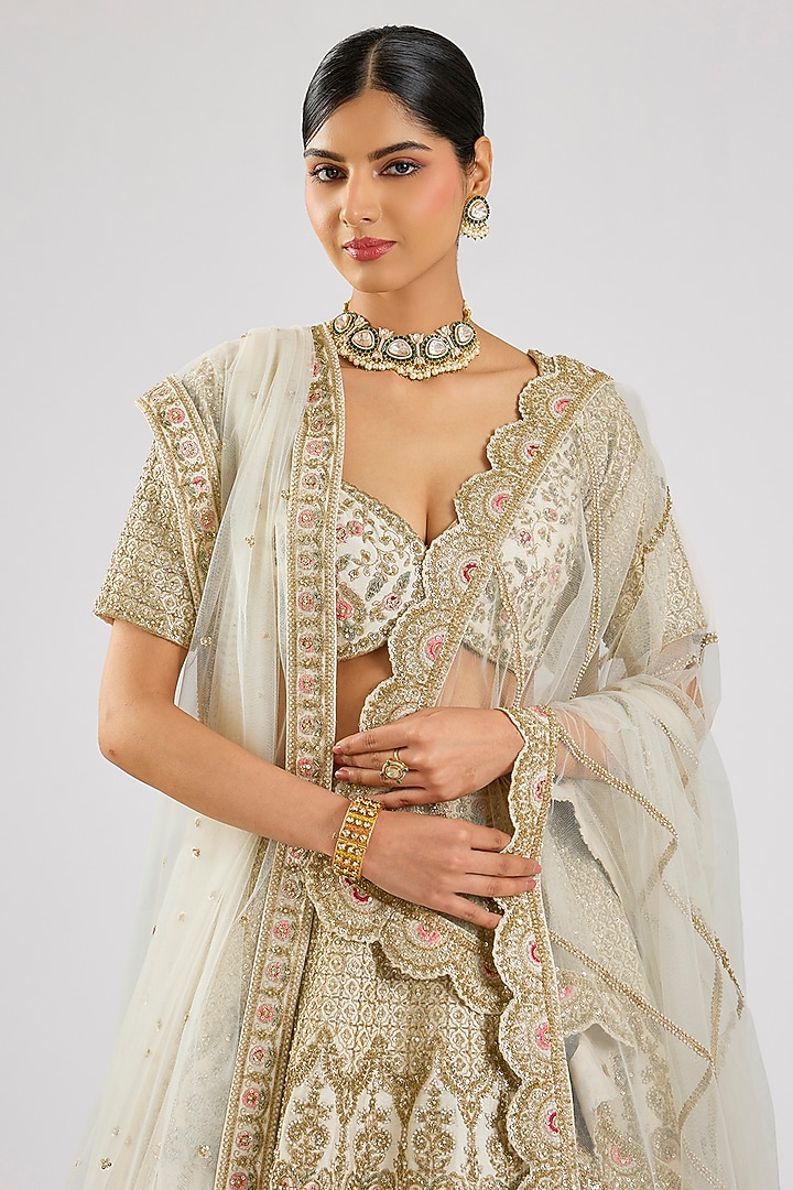 Ivory Raw Silk Embroidered Bridal Lehenga Set by Kalighata at Pernia's Pop Up Shop