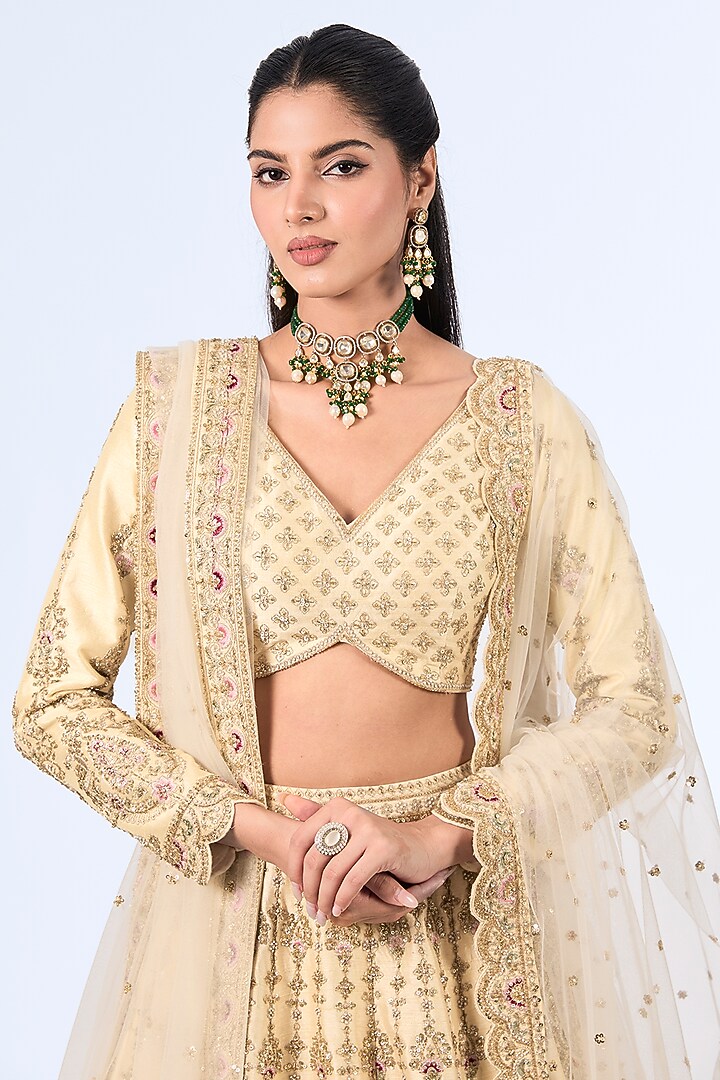 Ivory Raw Silk Zardosi Hand Embroidered Bridal Lehenga Set by Kalighata at Pernia's Pop Up Shop