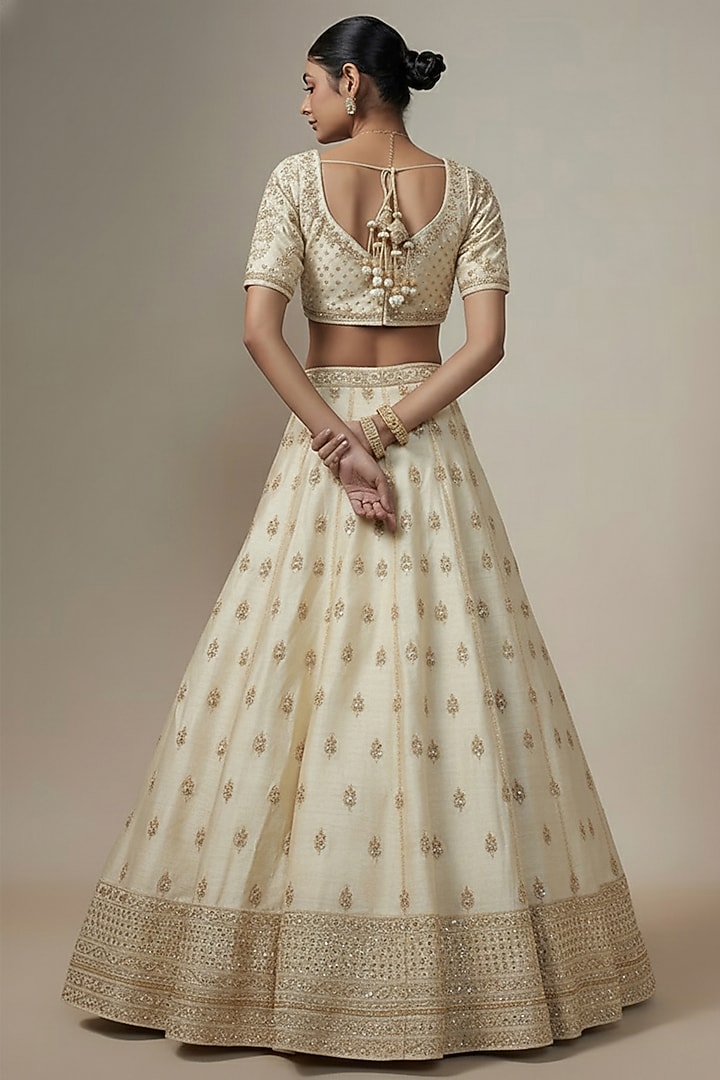 Ivory Metallic Organza Hand Embroidered Bridal Lehenga Set by Kalighata at Pernia's Pop Up Shop