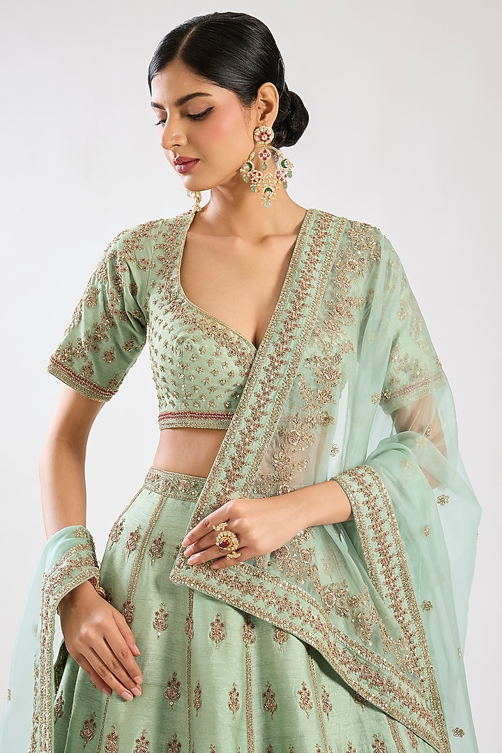 Firozi Blue Raw Silk Zari Hand Embroidered Bridal Lehenga Set by Kalighata at Pernia's Pop Up Shop