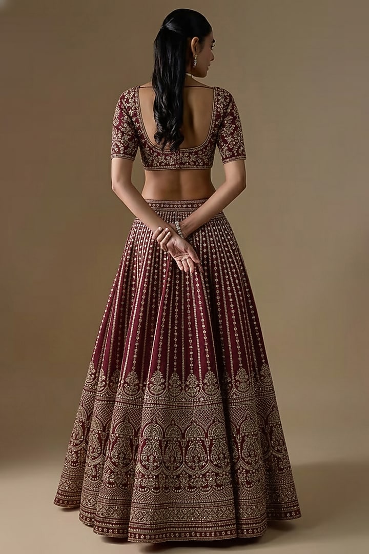 Maroon Raw Silk Hand & Machine Embroidered Bridal Lehenga Set by Kalighata at Pernia's Pop Up Shop