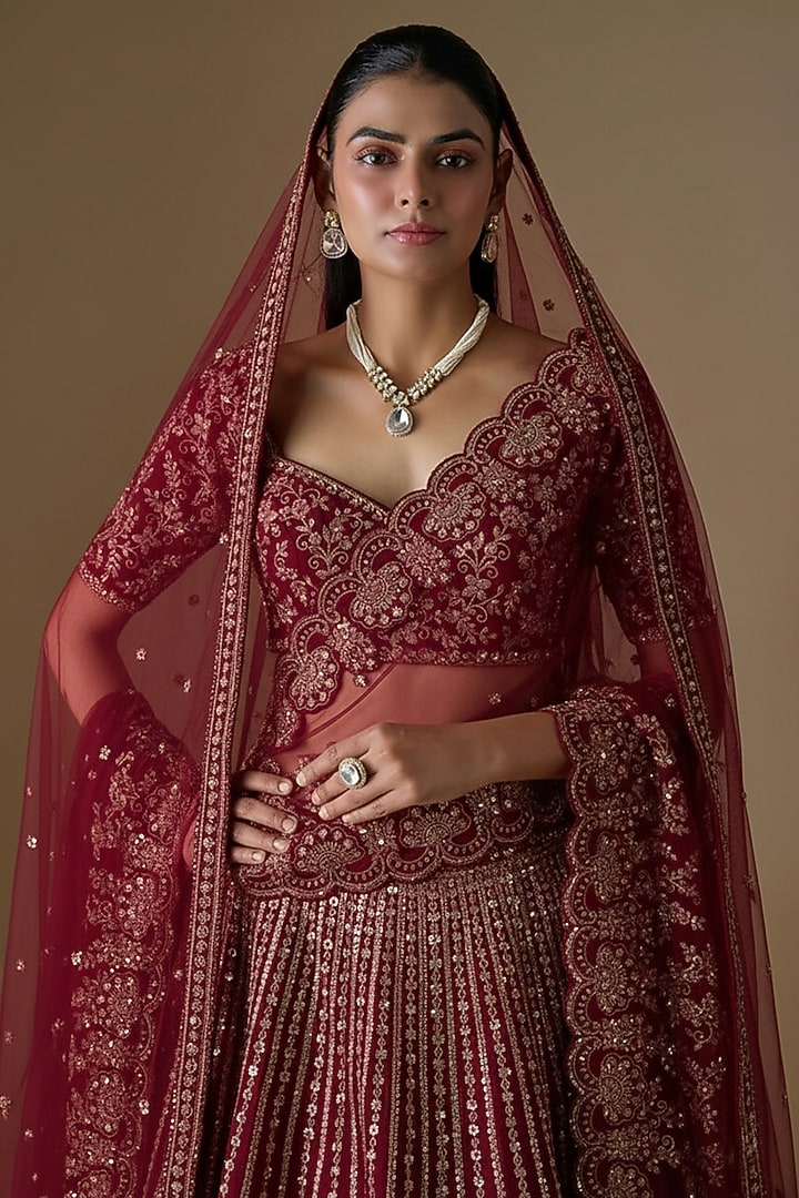 Maroon Raw Silk Hand & Machine Embroidered Bridal Lehenga Set by Kalighata at Pernia's Pop Up Shop