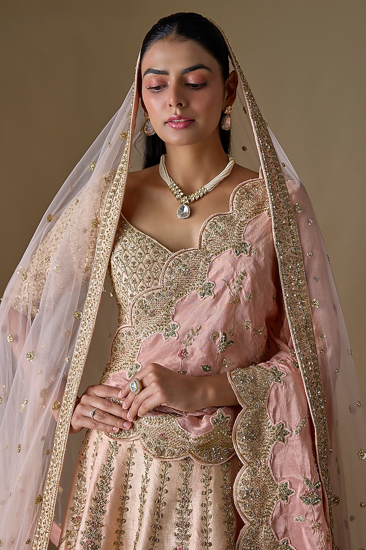 Ivory Raw Silk Zardosi Hand Embroidered Bridal Lehenga Set by Kalighata at Pernia's Pop Up Shop