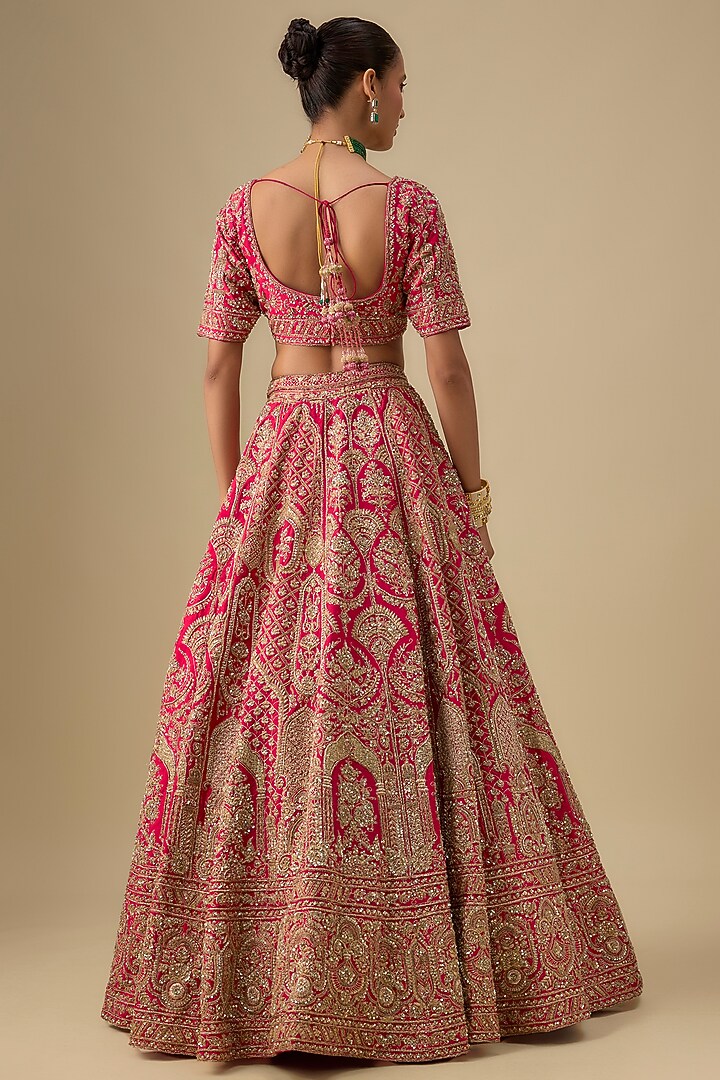 Rani Pink Raw Silk Hand & Machine Embroidered Bridal Lehenga Set by Kalighata at Pernia's Pop Up Shop