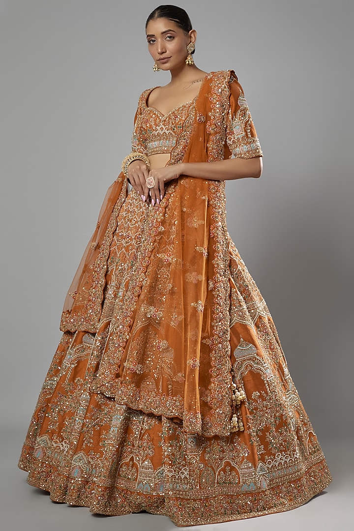 Rust Raw Silk Embroidered Bridal Lehenga Set by Kalighata at Pernia's Pop Up Shop