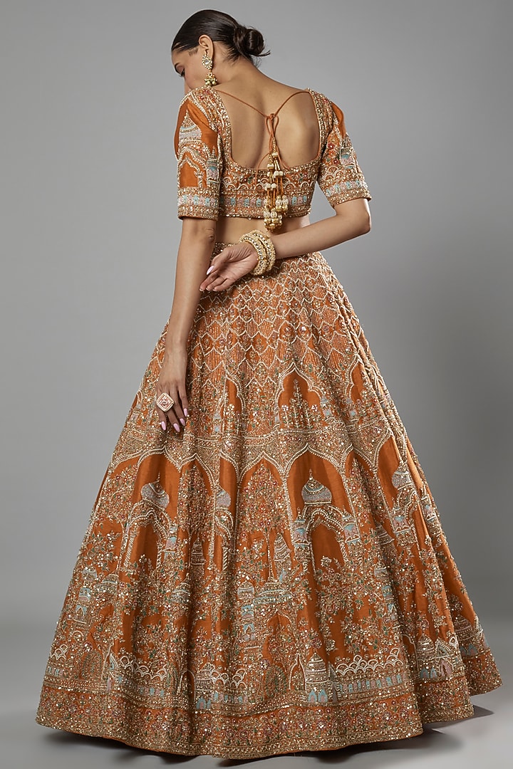 Rust Raw Silk Embroidered Bridal Lehenga Set by Kalighata at Pernia's Pop Up Shop