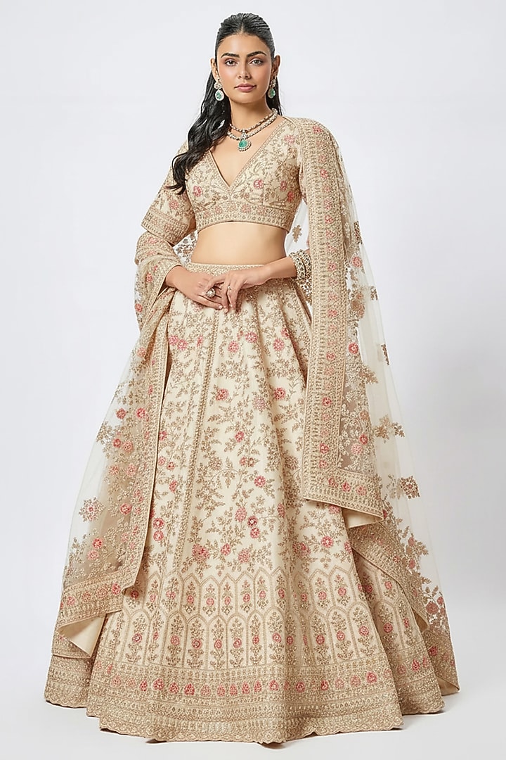 Ivory Raw Silk Hand & Machine Embroidered Bridal Lehenga Set by Kalighata at Pernia's Pop Up Shop
