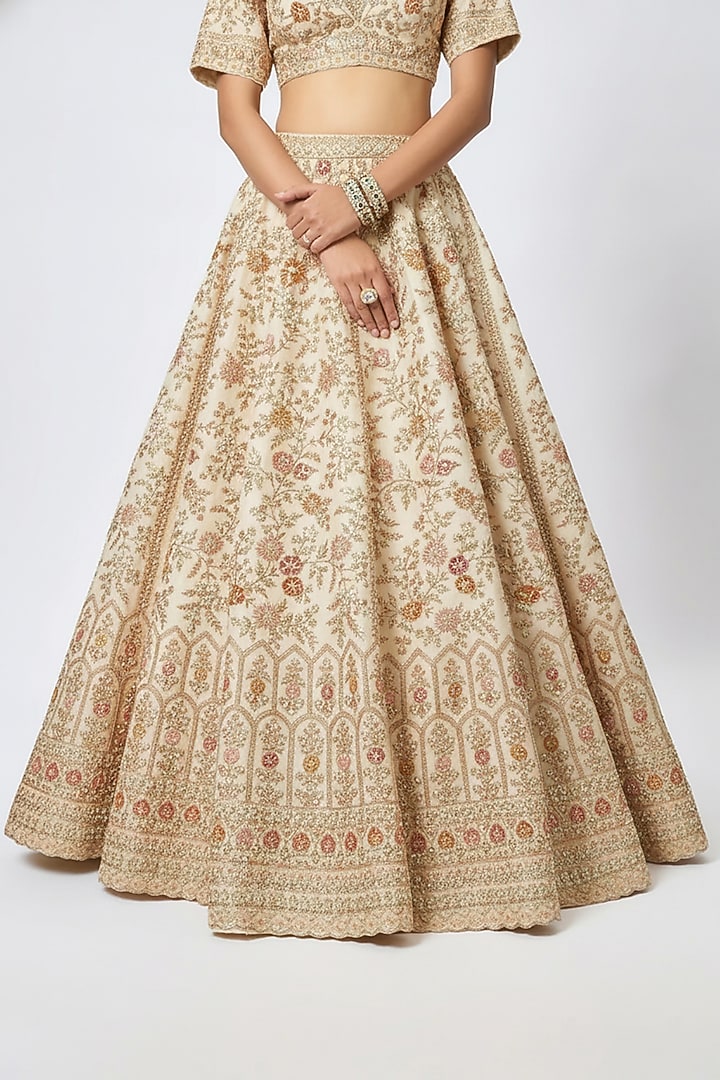 Ivory Raw Silk Hand & Machine Embroidered Bridal Lehenga Set by Kalighata at Pernia's Pop Up Shop