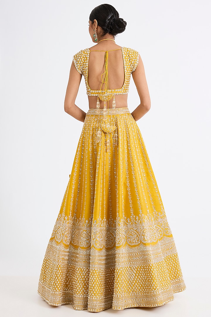 Yellow Raw Silk Zari Hand & Machine Embroidered Bridal Lehenga Set by Kalighata at Pernia's Pop Up Shop