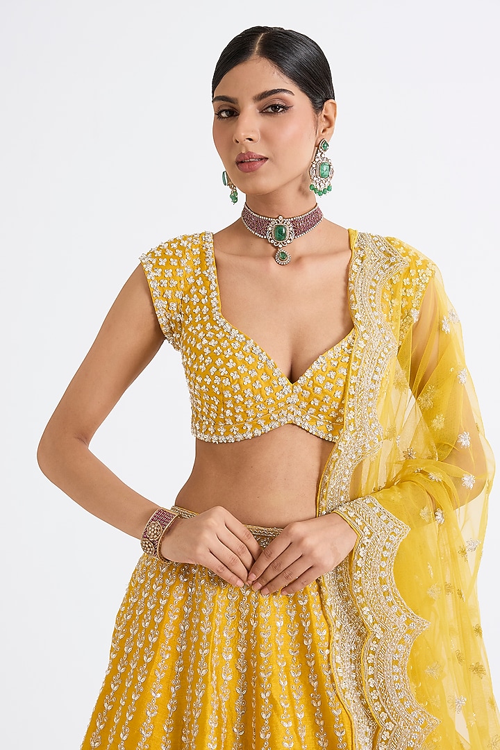 Yellow Raw Silk Zari Hand & Machine Embroidered Bridal Lehenga Set by Kalighata at Pernia's Pop Up Shop