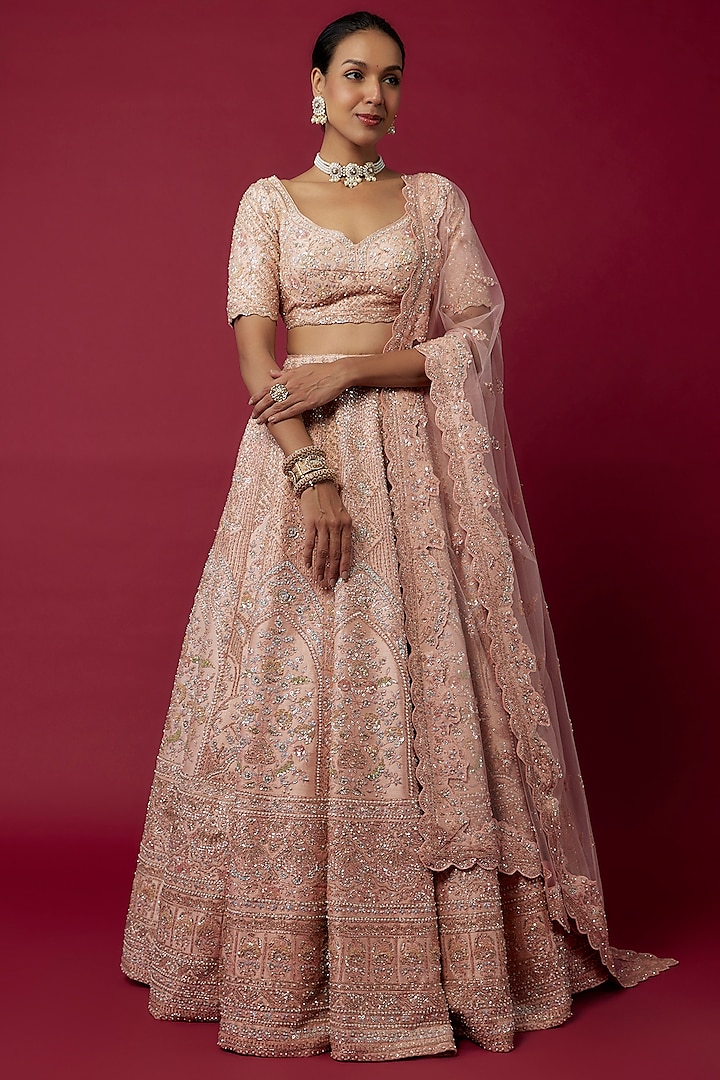 Peach Raw Silk Hand & Machine Embroidered Bridal Lehenga Set by Kalighata at Pernia's Pop Up Shop
