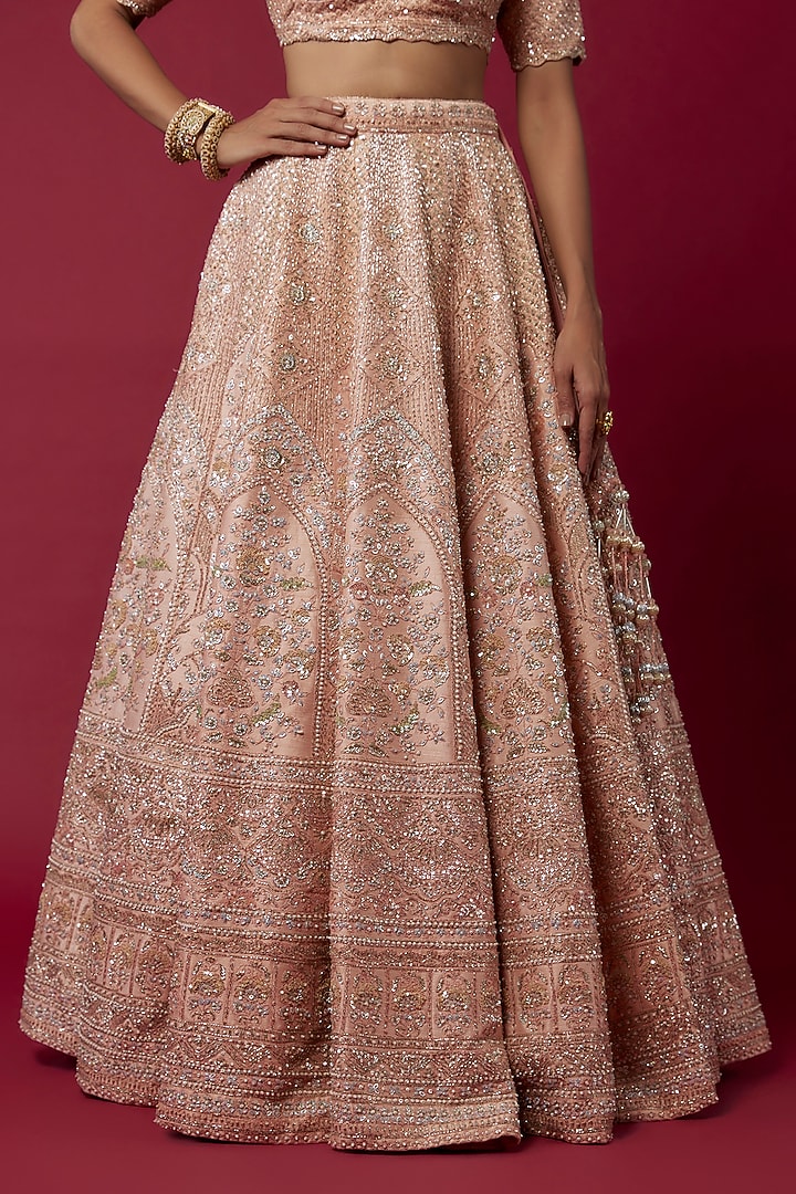 Peach Raw Silk Hand & Machine Embroidered Bridal Lehenga Set by Kalighata at Pernia's Pop Up Shop