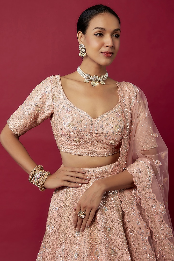 Peach Raw Silk Hand & Machine Embroidered Bridal Lehenga Set by Kalighata at Pernia's Pop Up Shop