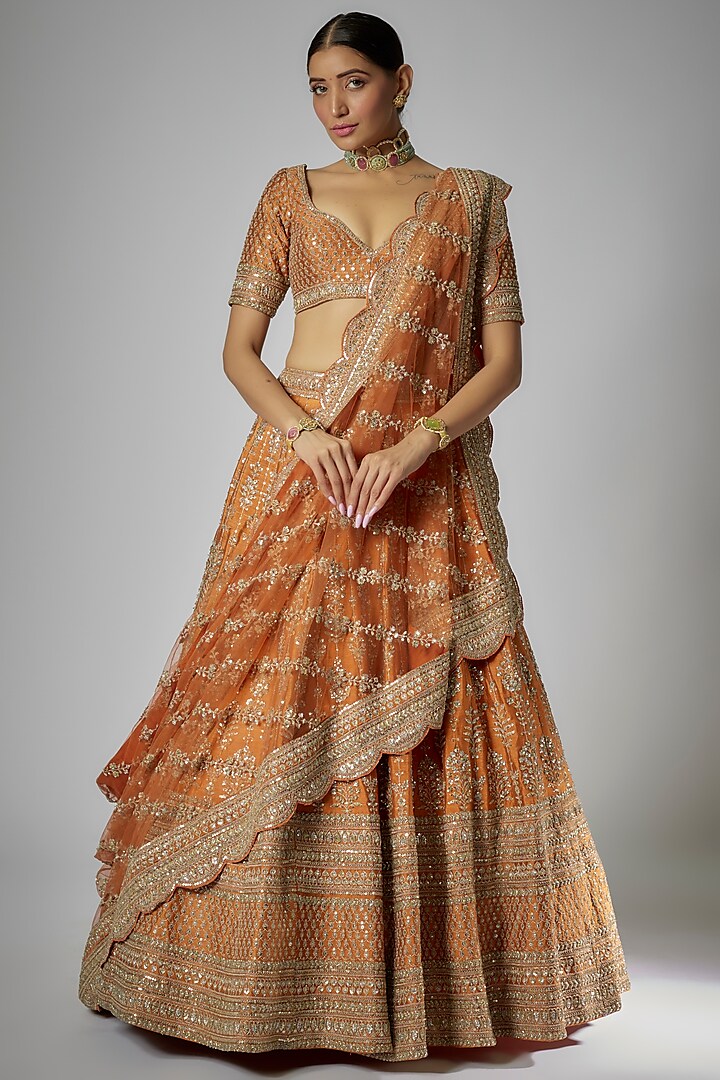 Rust Raw Silk Embroidered Bridal Lehenga Set by Kalighata at Pernia's Pop Up Shop