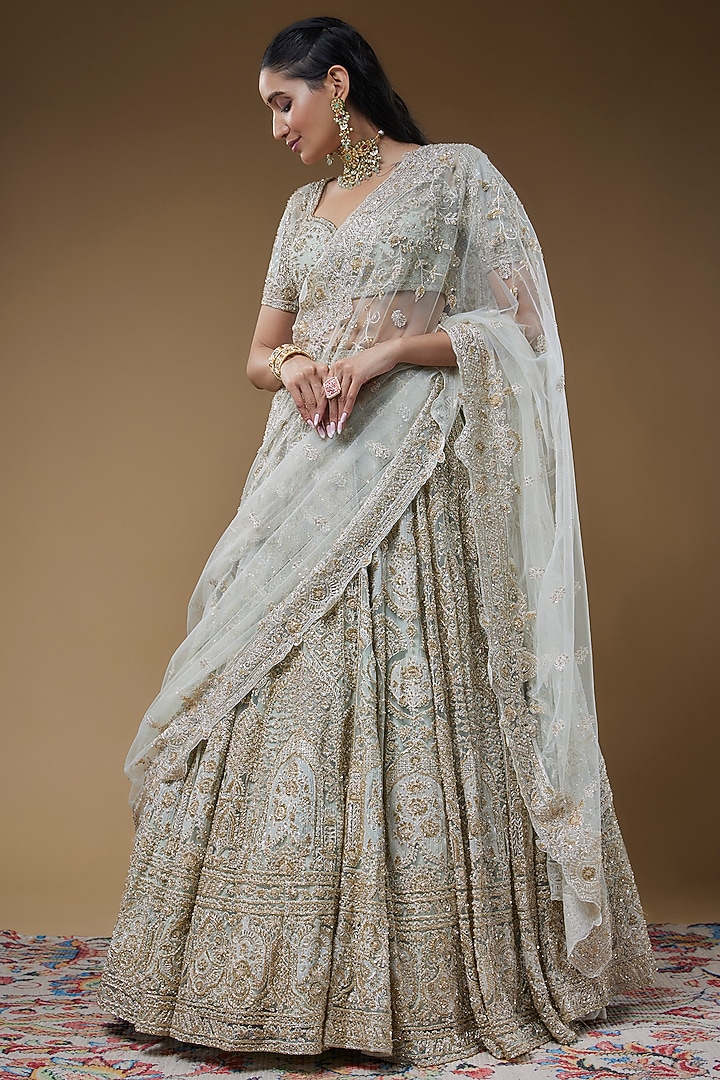 Ivory Organza Embroidered Bridal Lehenga Set by Kalighata at Pernia's Pop Up Shop