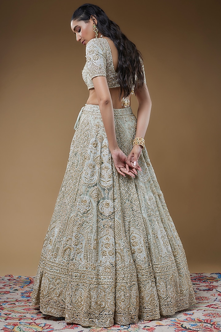 Ivory Organza Embroidered Bridal Lehenga Set by Kalighata at Pernia's Pop Up Shop