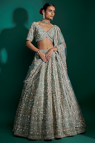 Dusty Firoza Raw Silk Sequins Hand & Machine Embroidered Lehenga Set by Kalighata