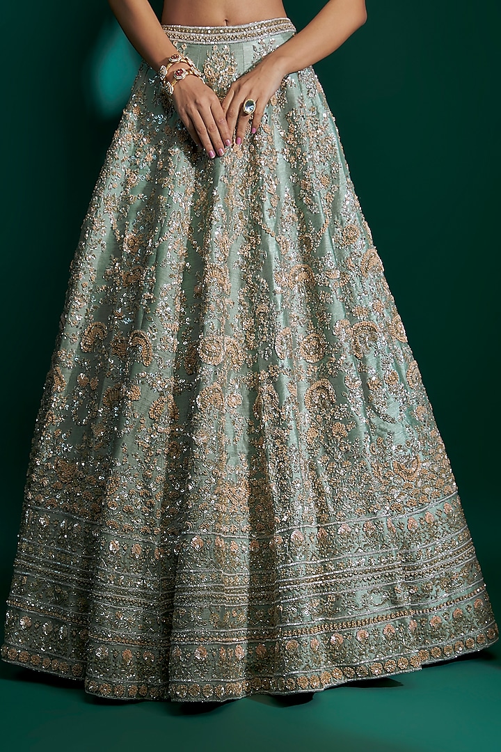 Dusty Firoza Raw Silk Sequins Hand & Machine Embroidered Bridal Lehenga Set by Kalighata at Pernia's Pop Up Shop