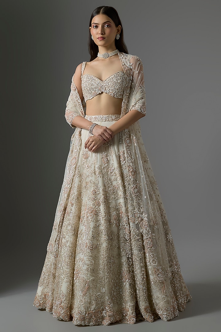 Ivory Net Embroidered Bridal Lehenga Set by Kalighata at Pernia's Pop Up Shop