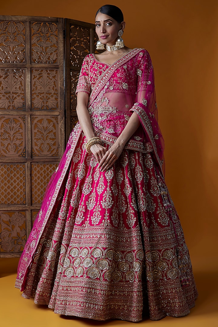 Rani Pink Raw Silk Embellished Bridal Lehenga Set by Kalighata at Pernia's Pop Up Shop