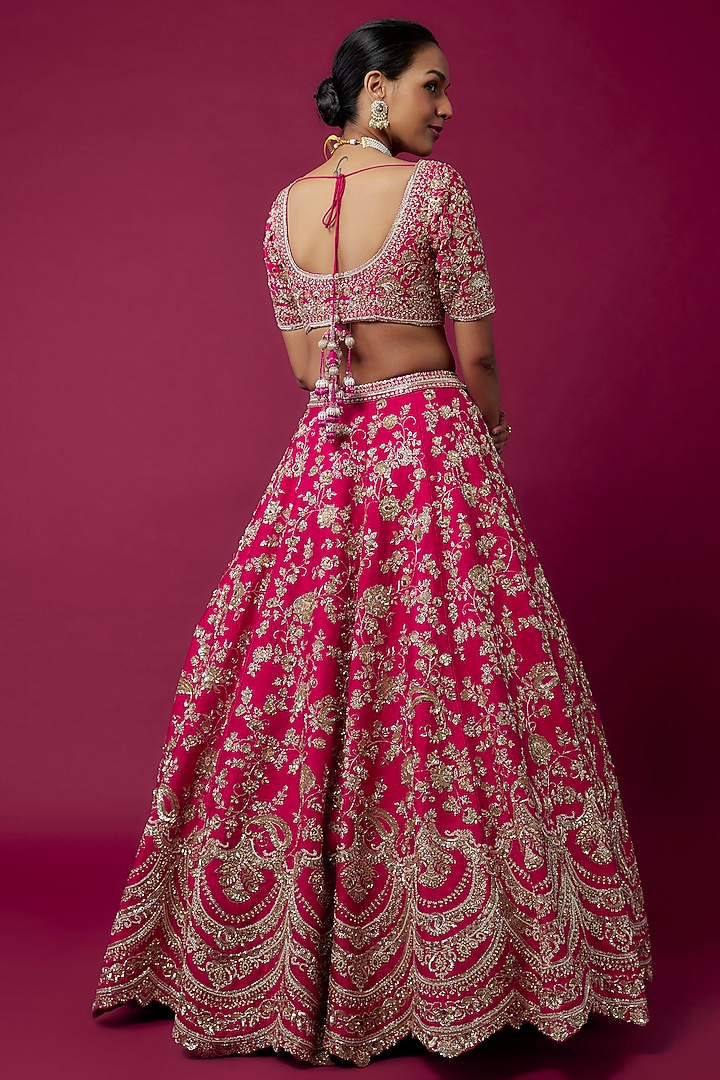 Rani Pink Raw Silk Hand & Machine Embroidered Bridal Lehenga Set by Kalighata at Pernia's Pop Up Shop