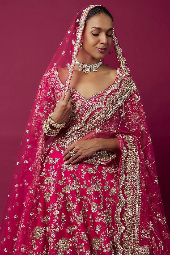 Rani Pink Raw Silk Hand & Machine Embroidered Bridal Lehenga Set by Kalighata at Pernia's Pop Up Shop
