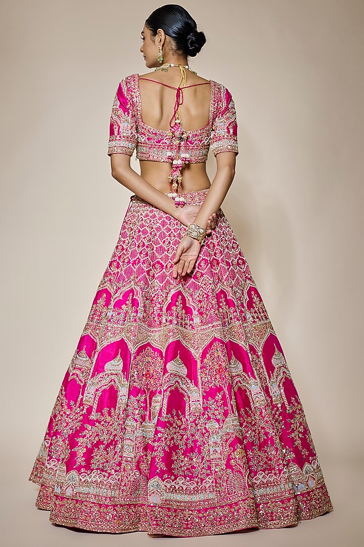 Rani Pink Raw Silk Hand & Machine Embroidered Bridal Lehenga Set by Kalighata at Pernia's Pop Up Shop
