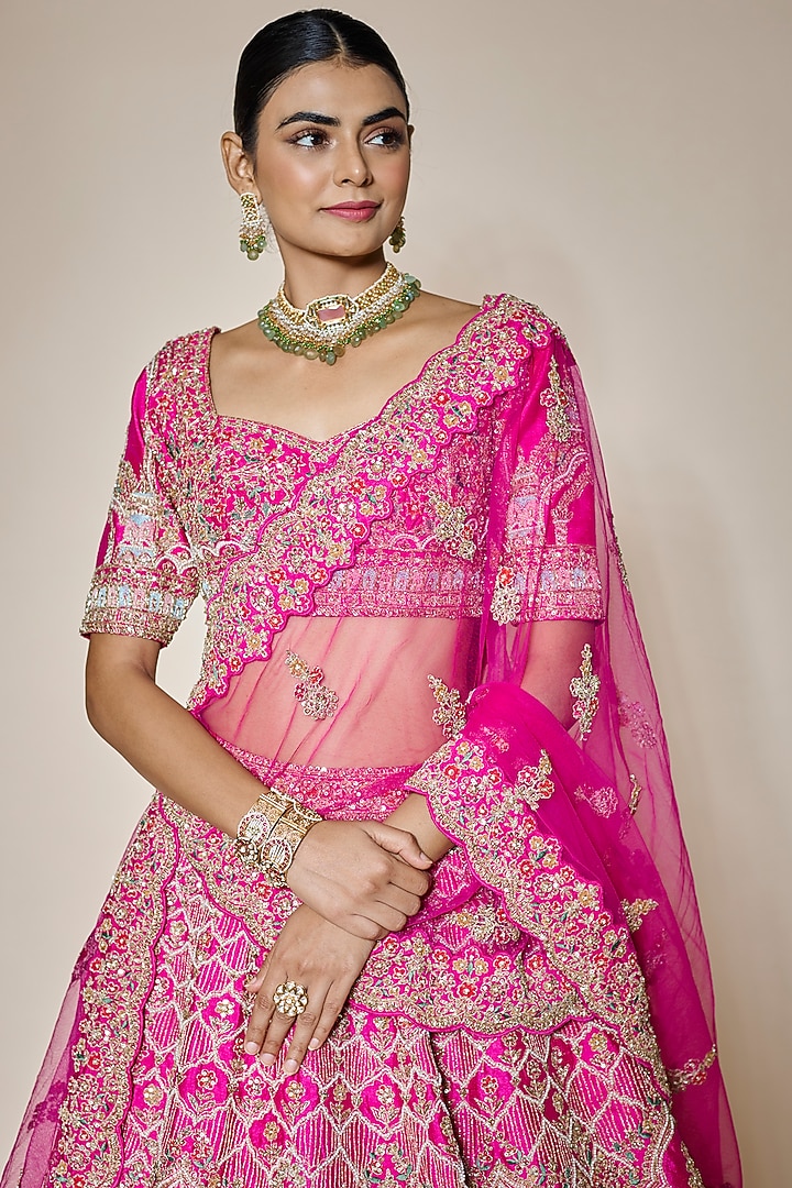Rani Pink Raw Silk Hand & Machine Embroidered Bridal Lehenga Set by Kalighata at Pernia's Pop Up Shop