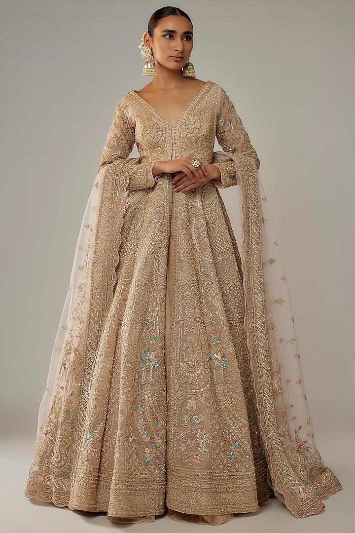 Beige Net Sequins Embroidered Jacket Bridal Lehenga Set by Kalighata at Pernia's Pop Up Shop