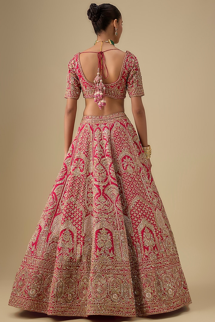 Rani Pink Raw Silk Hand & Machine Embroidered Bridal Lehenga Set by Kalighata at Pernia's Pop Up Shop
