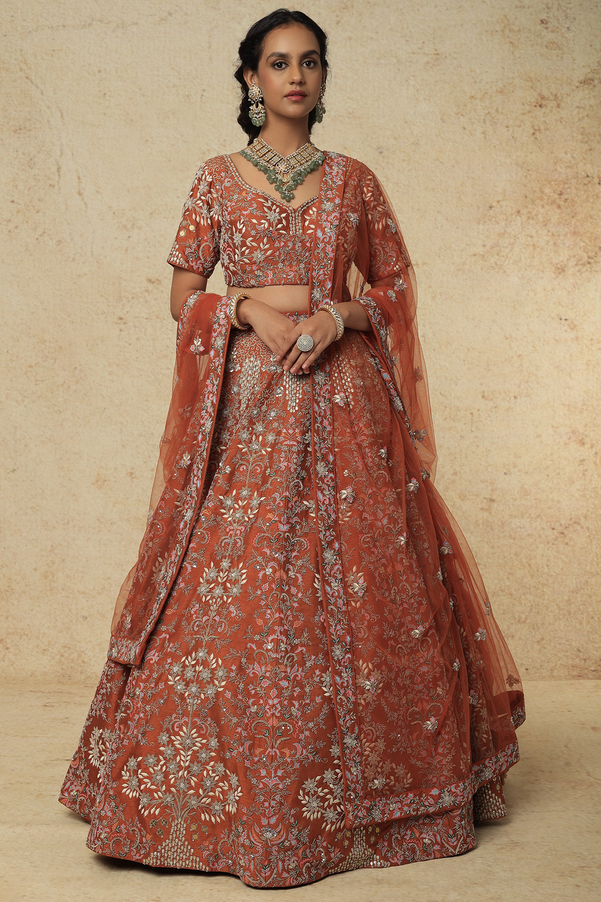 Rust Hand Embroidered Trishul Bridal Lehenga Set by Kalighata at Pernia's Pop Up Shop