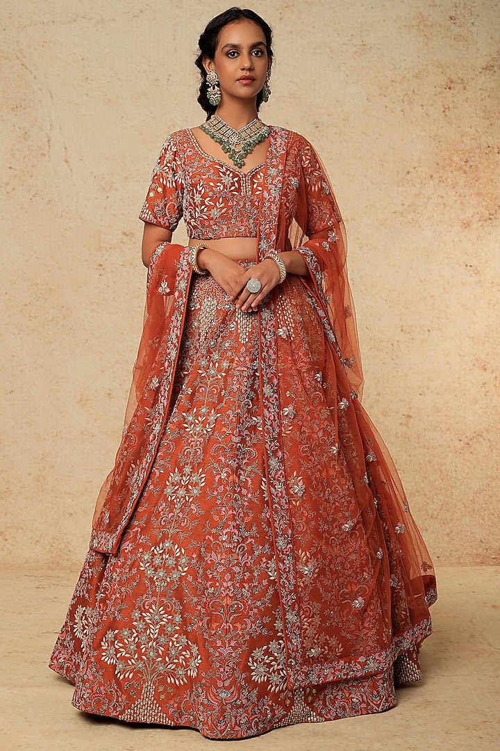 Rust Hand Embroidered Trishul Bridal Lehenga Set by Kalighata at Pernia's Pop Up Shop