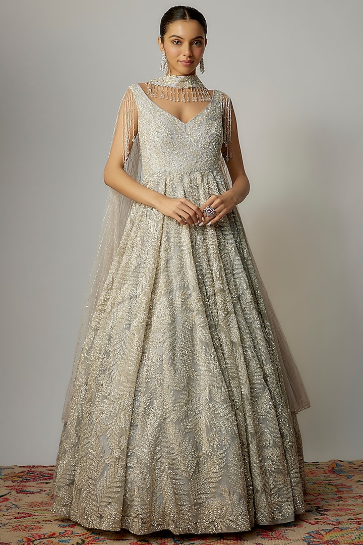 Grey Net Sequins Embellished Gown With Dupatta by Kalighata