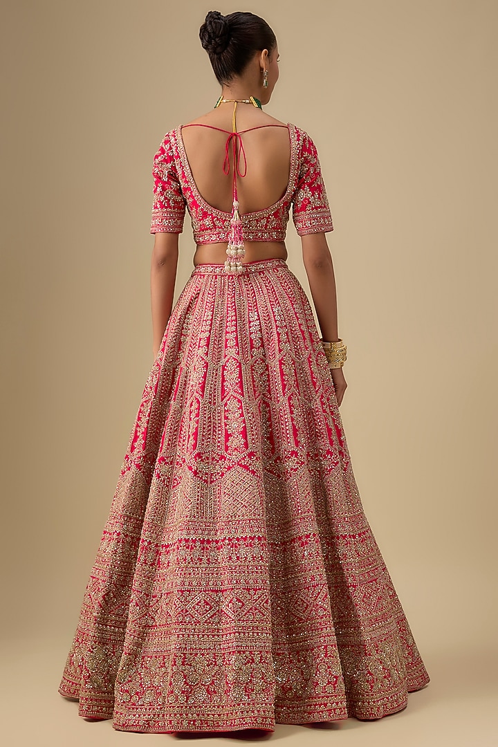 Rani Pink Raw Silk Hand & Machine Embroidered Bridal Lehenga Set by Kalighata at Pernia's Pop Up Shop