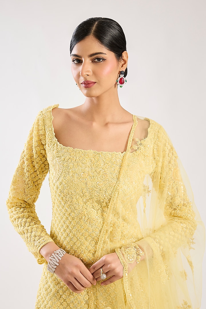 Yellow Net Hand & Machine Embroidered Bridal Sharara Set by Kalighata at Pernia's Pop Up Shop