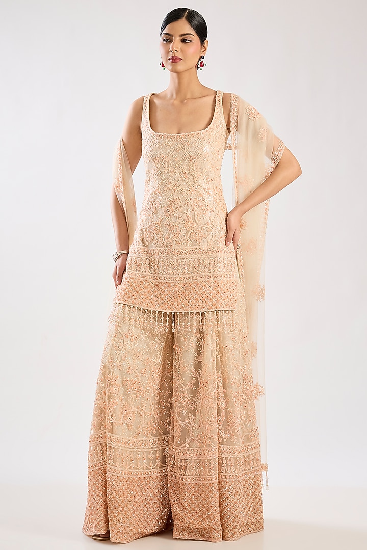 Peach Net Hand & Machine Embroidered Bridal Sharara Set by Kalighata at Pernia's Pop Up Shop