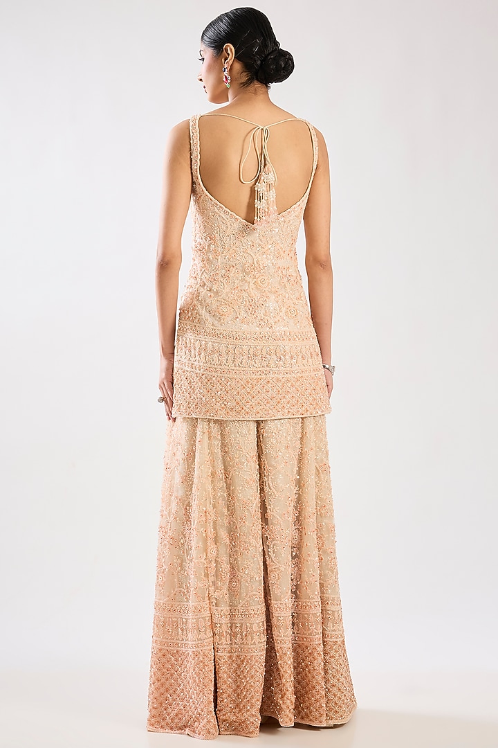 Peach Net Hand & Machine Embroidered Bridal Sharara Set by Kalighata at Pernia's Pop Up Shop