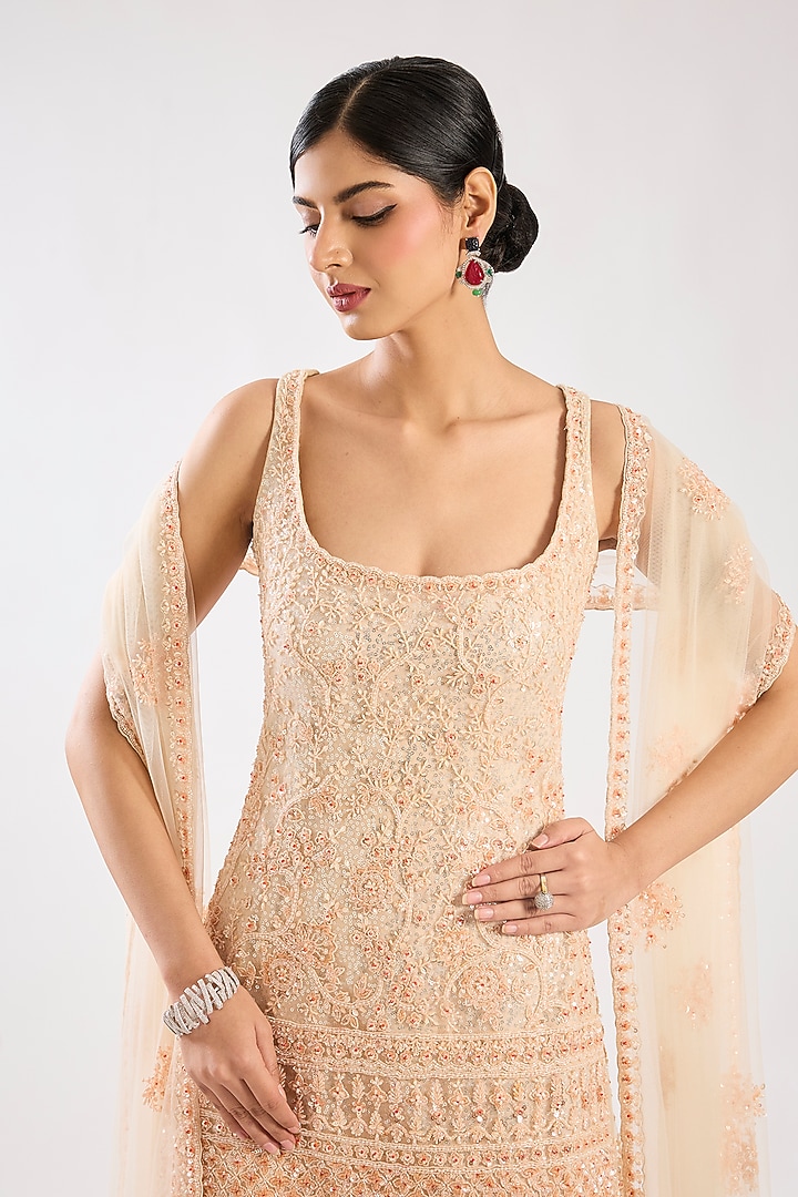 Peach Net Hand & Machine Embroidered Bridal Sharara Set by Kalighata at Pernia's Pop Up Shop