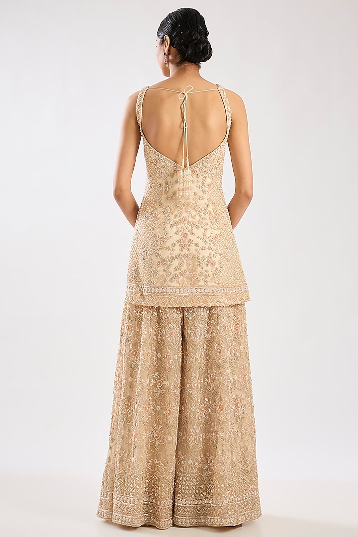 Peach Net Hand & Machine Embroidered Bridal Sharara Set by Kalighata at Pernia's Pop Up Shop