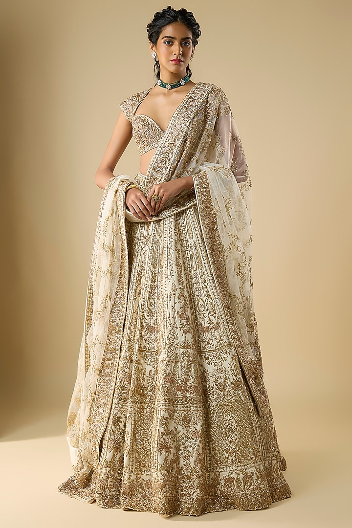 Ivory Raw Silk Zari Hand Embroidered Bridal Lehenga Set by Kalighata at Pernia's Pop Up Shop