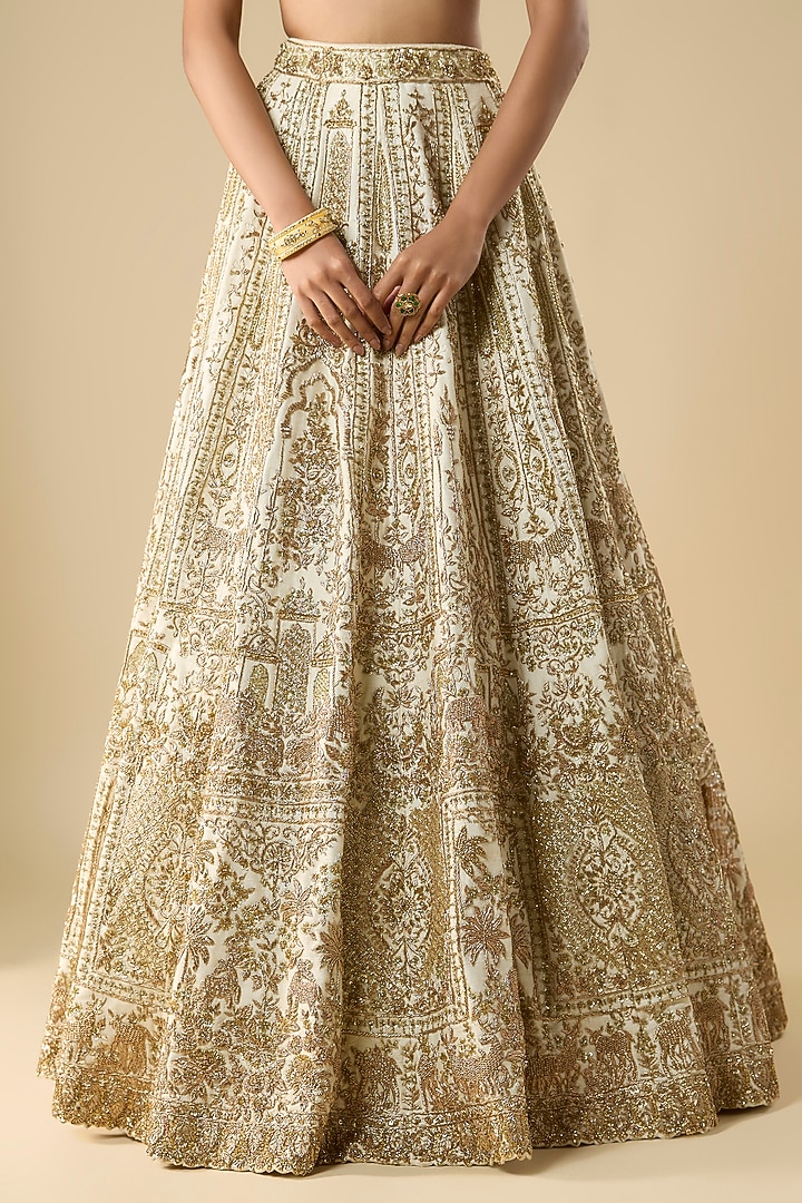 Ivory Raw Silk Zari Hand Embroidered Bridal Lehenga Set by Kalighata at Pernia's Pop Up Shop