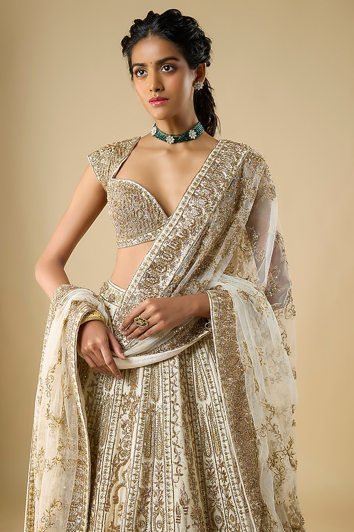 Ivory Raw Silk Zari Hand Embroidered Bridal Lehenga Set by Kalighata at Pernia's Pop Up Shop