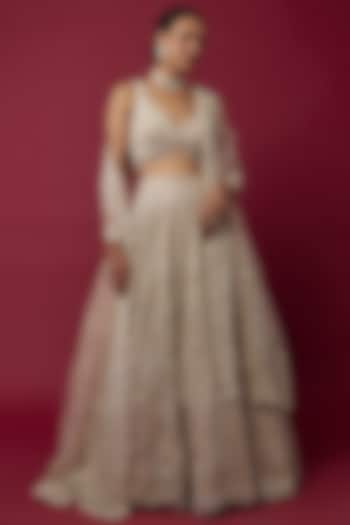 Ivory Net Sequins Embroidered Bridal Lehenga Set by Kalighata at Pernia's Pop Up Shop