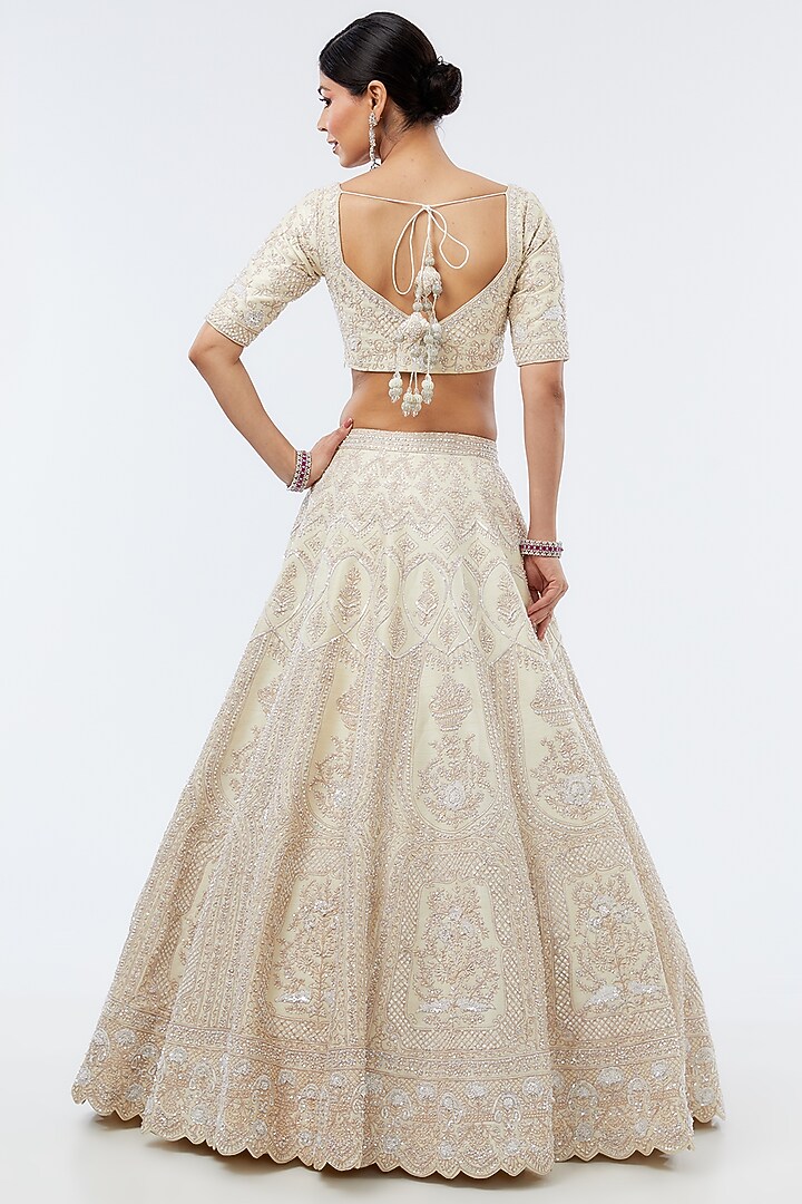 Ivory Raw Silk Hand Embroidered & Machine Embroidered Bridal Lehenga Set by Kalighata at Pernia's Pop Up Shop