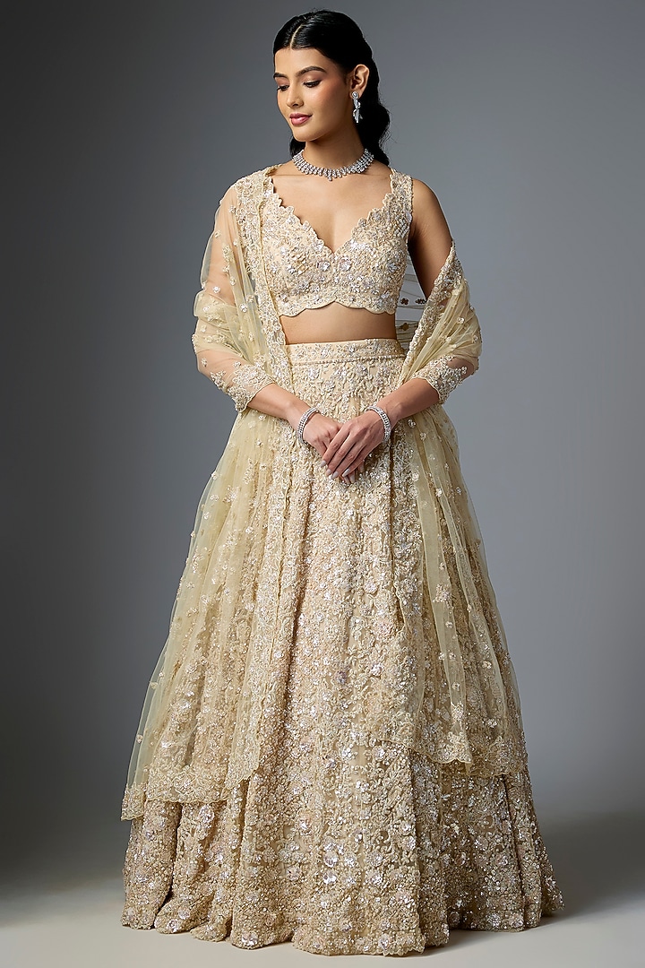 Gold Net Embroidered Bridal Lehenga Set by Kalighata at Pernia's Pop Up Shop