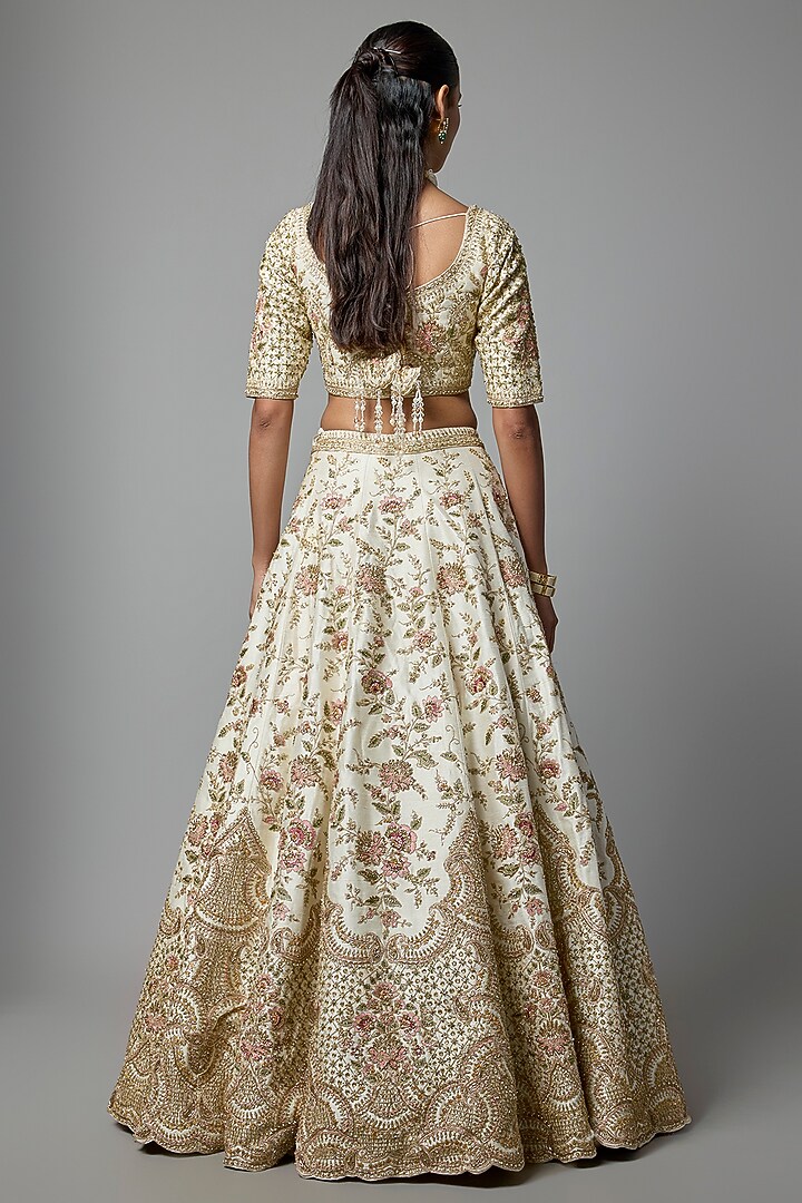 Ivory Raw Silk Embroidered Bridal Lehenga Set by Kalighata at Pernia's Pop Up Shop