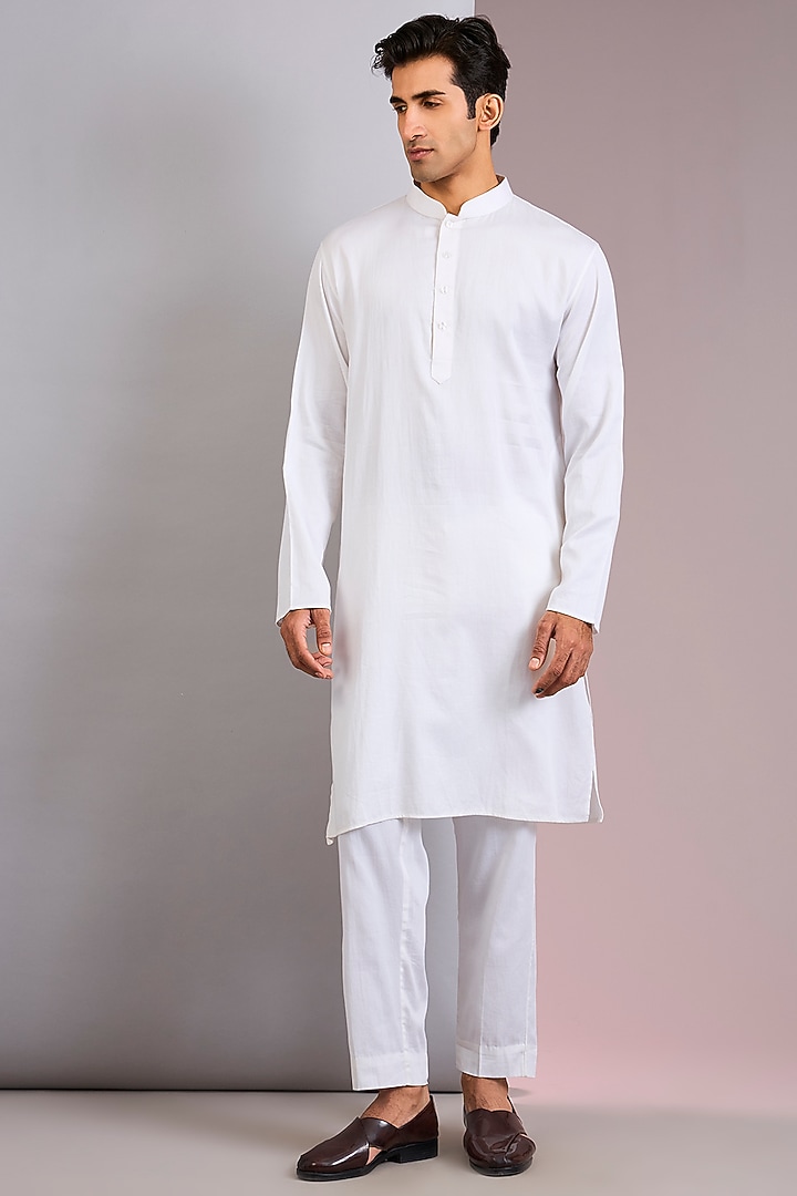 Ivory Raw Silk Groom Sherwani Set by Kalighata Men at Pernia's Pop Up Shop