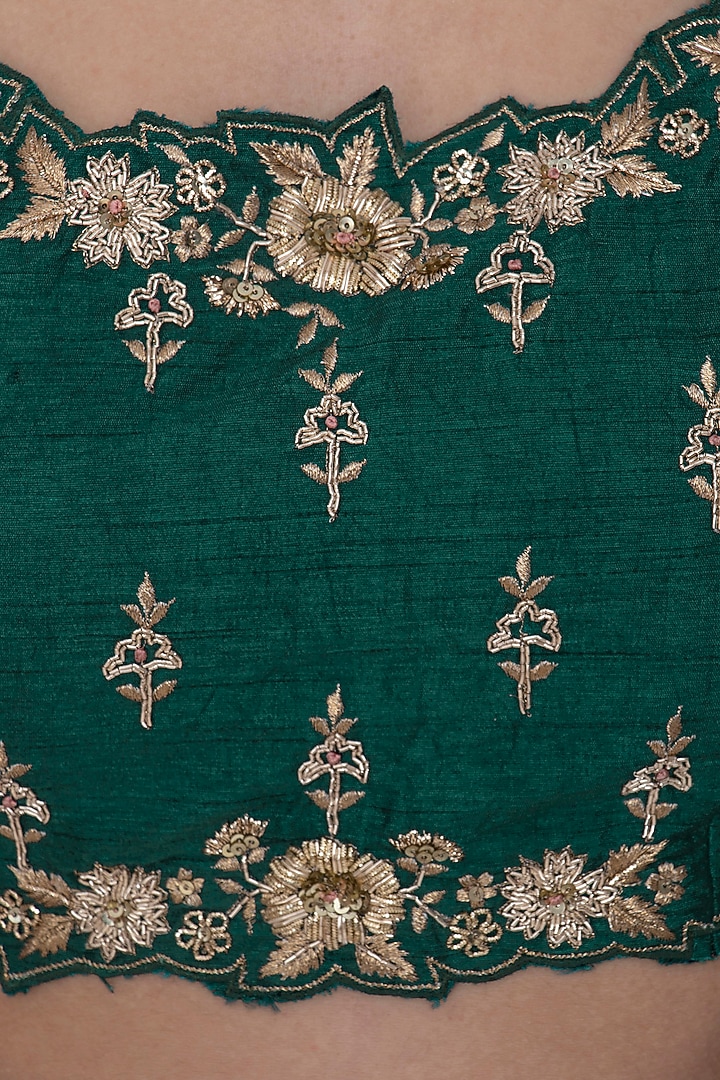 Emerald green embroidered lehenga set available only at Pernia's Pop Up Shop.