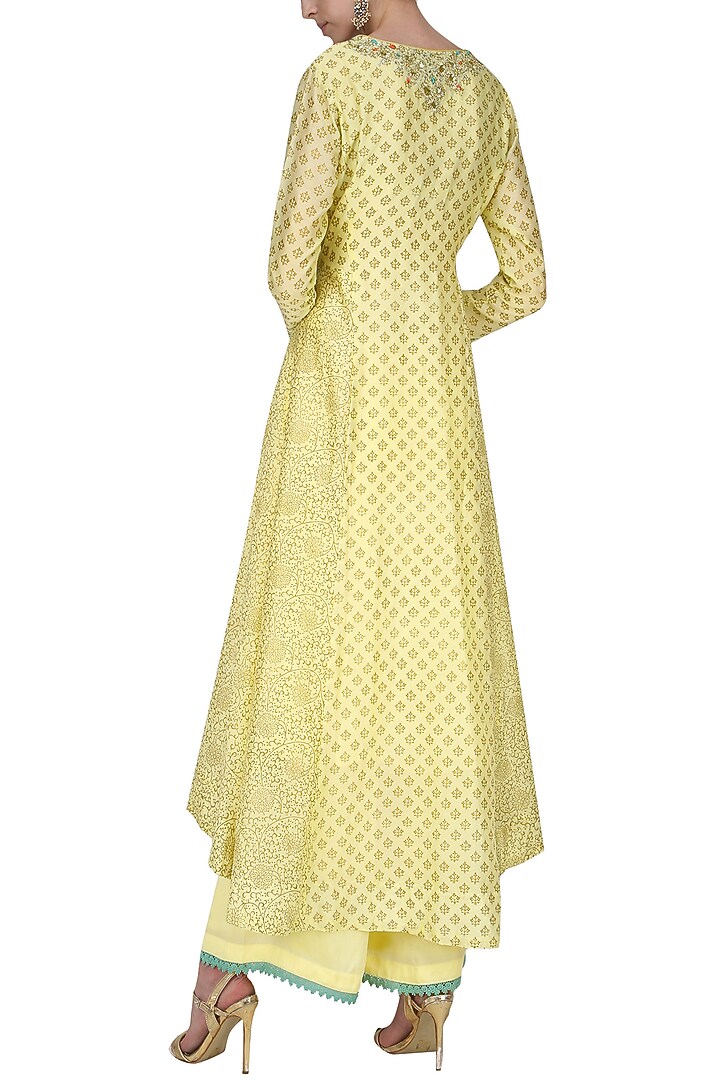 Cream asymmetrical block printing kurta and pants set available only at Pernia's Pop Up Shop.