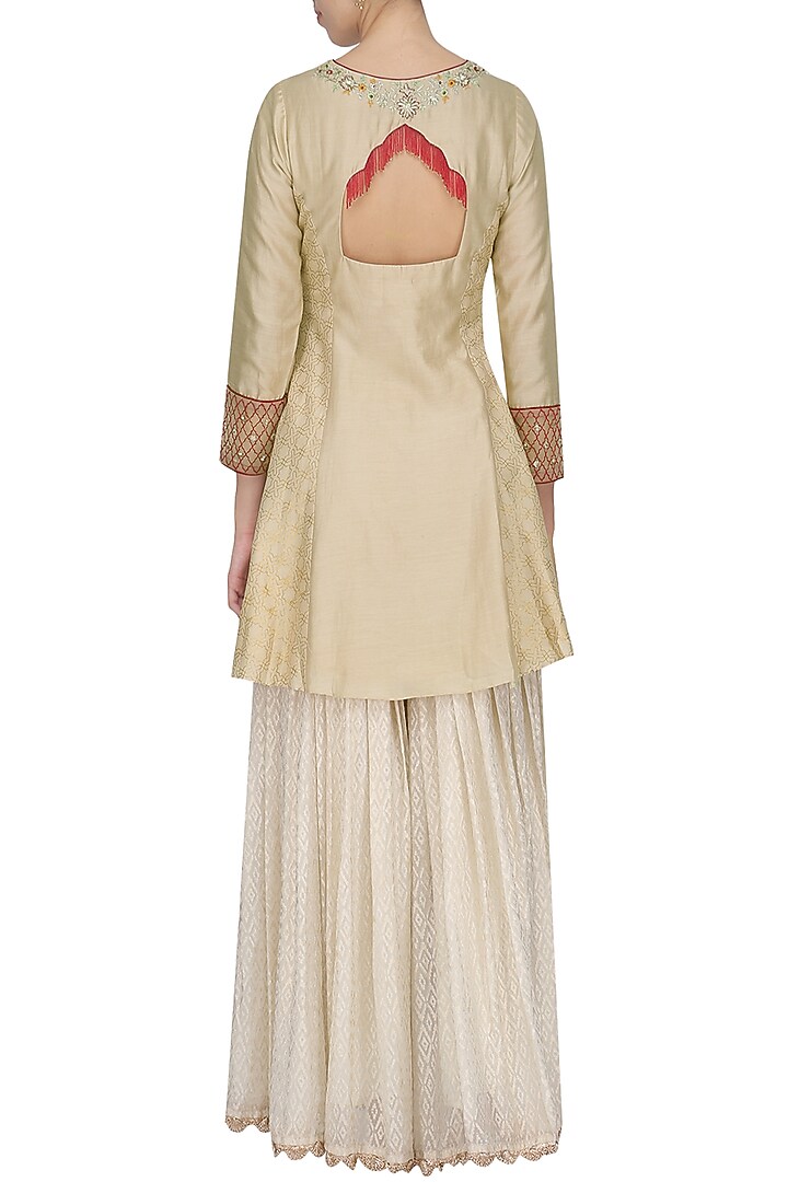 Gold and off white embroidered sharara set available only at Pernia's Pop Up Shop.